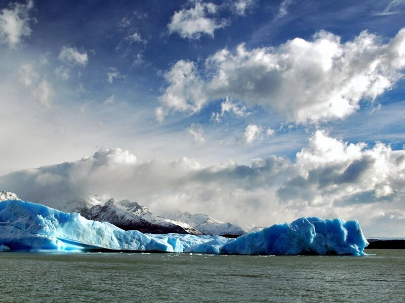Blue icebergs in a glacial lake