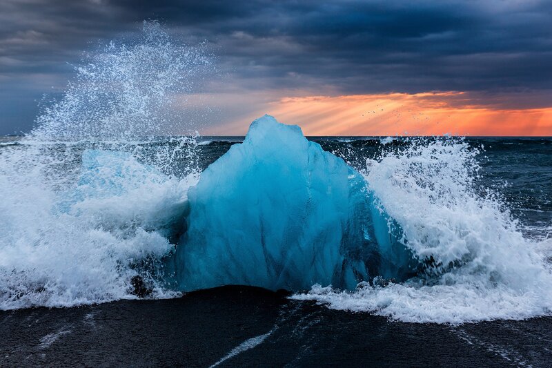 Blue Icebergs in Ocean — Dramatic