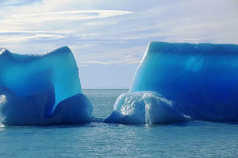 Blue Icebergs in Ocean
