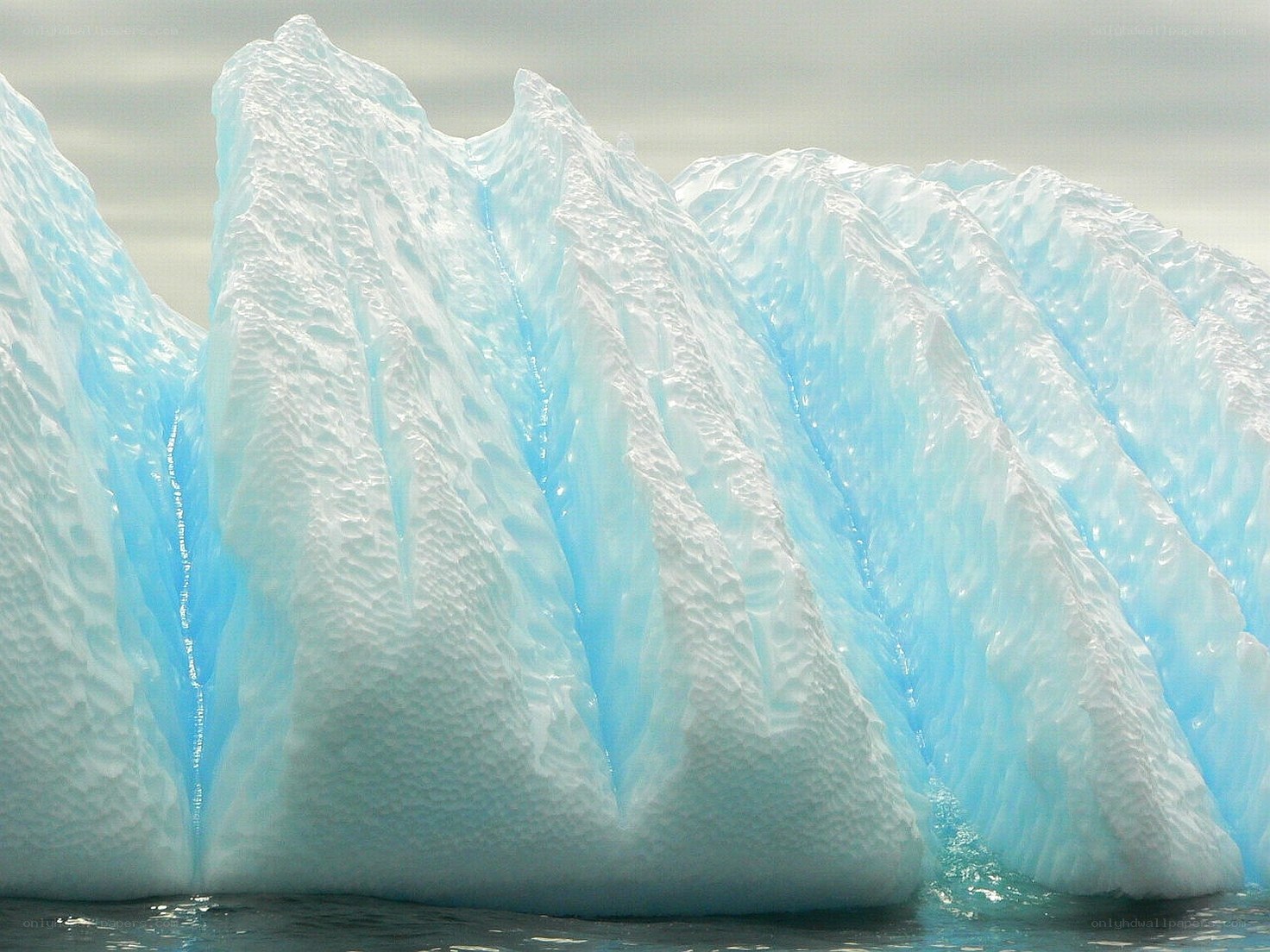 Blue icebergs in the ocean