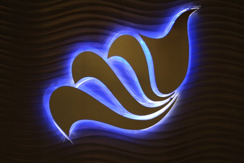 blue illuminated wave logo