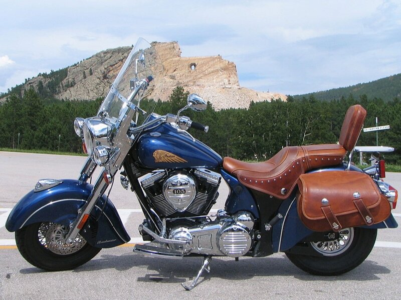 Blue Indian motorcycle at Mount Rushmore