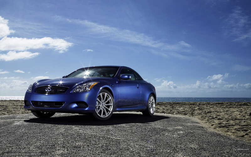 Blue Infiniti G37 Coupe on beach