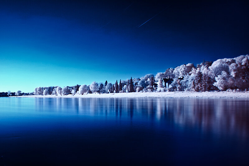 Blue infrared lakeside scene