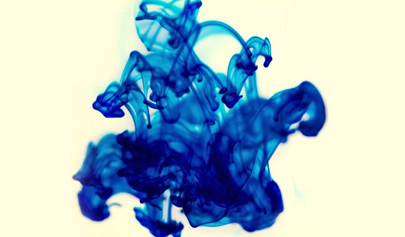 blue ink dispersing in water
