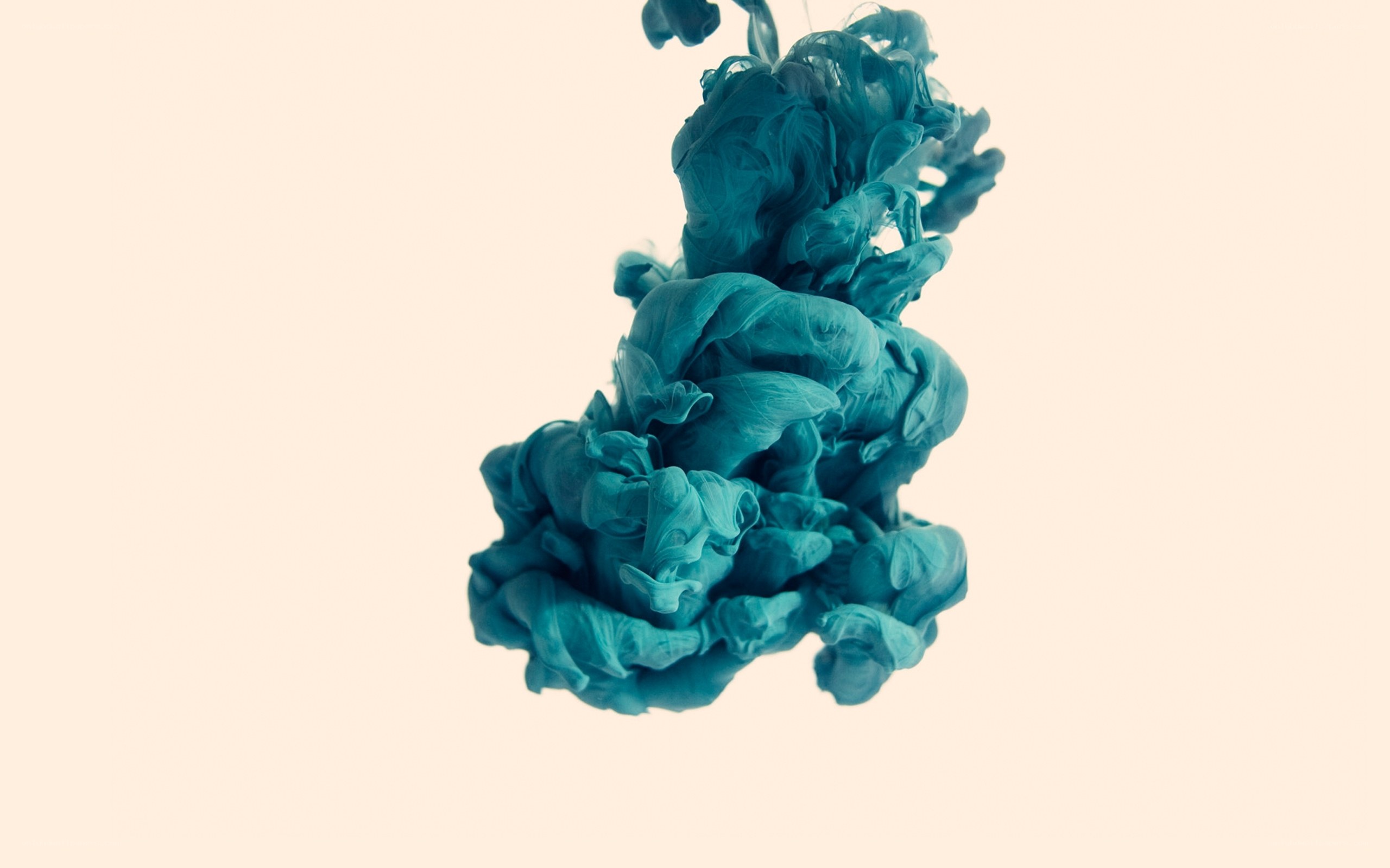 Blue ink dispersing in water