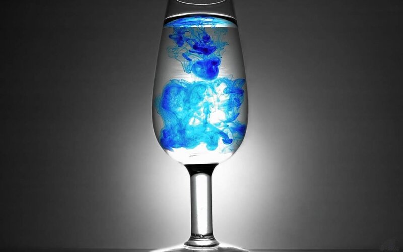 Blue Ink in Wine Glass — Dramatic