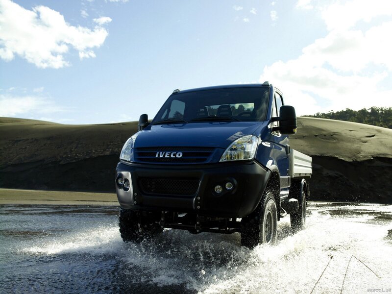 Blue Iveco truck in water