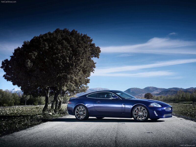Blue Jaguar C-XF on a country road