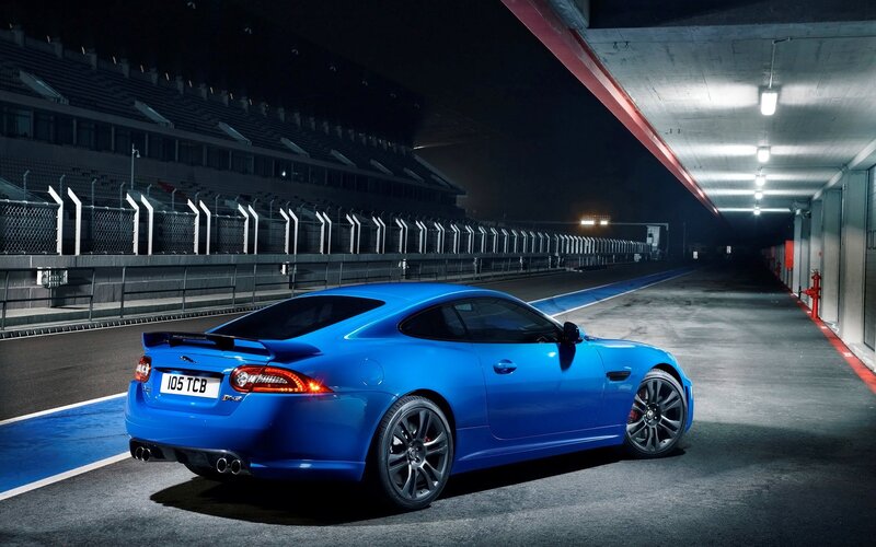 Blue Jaguar Car — Dramatic, Night, Photograph, Race Track