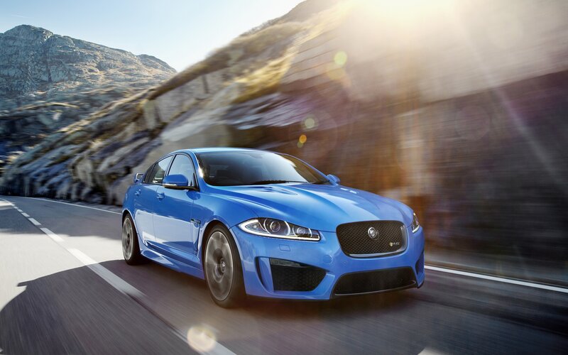 Blue Jaguar Car — Dynamic, Afternoon, Photograph, Road