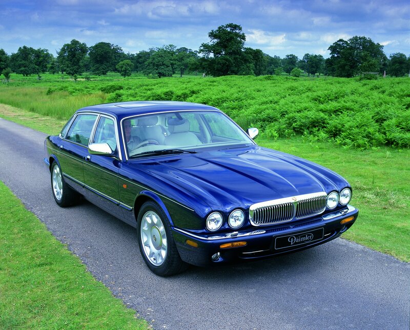 Blue Jaguar Daimler on a country road