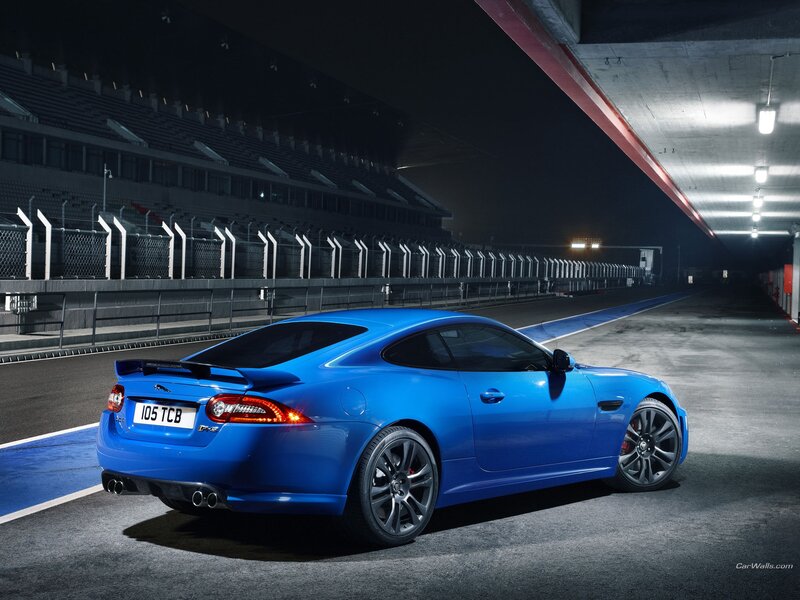 Blue Jaguar F-Type on racetrack