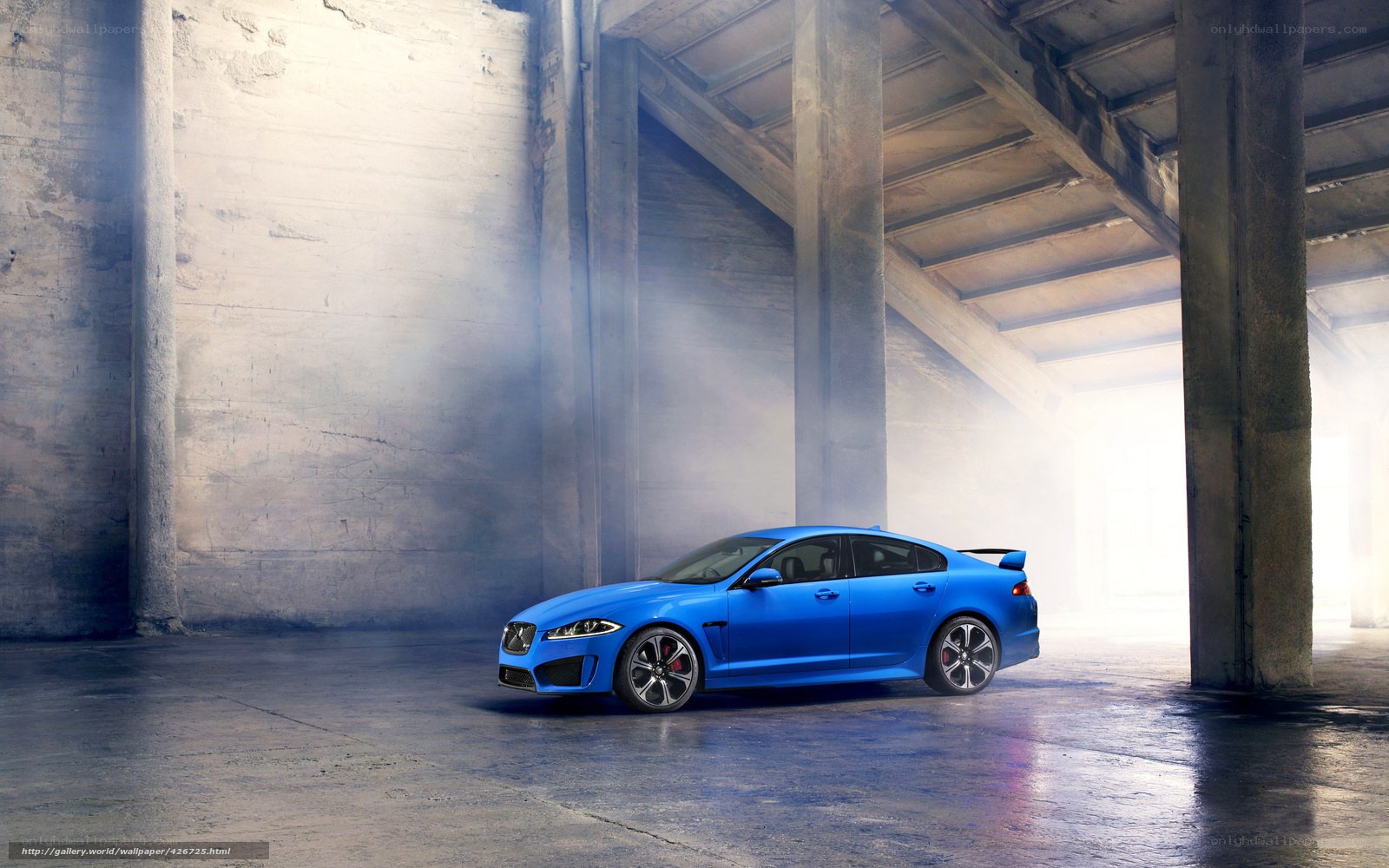 Blue Jaguar in a warehouse