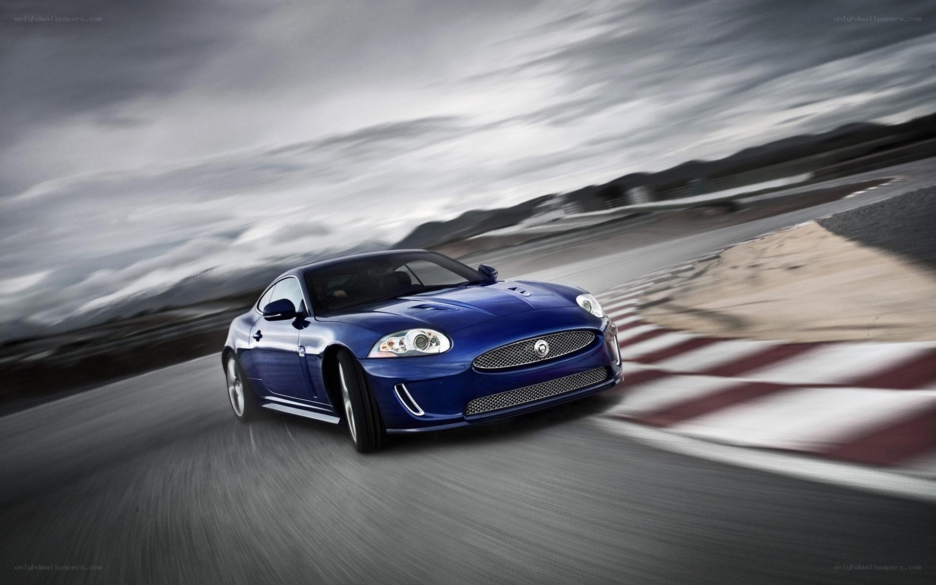 Blue Jaguar on a racetrack