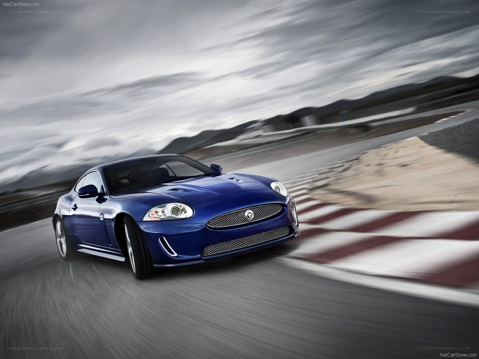 Blue Jaguar on a racetrack