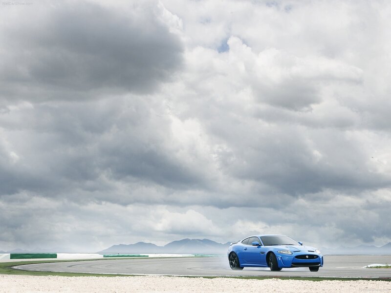 Blue Jaguar on a racetrack