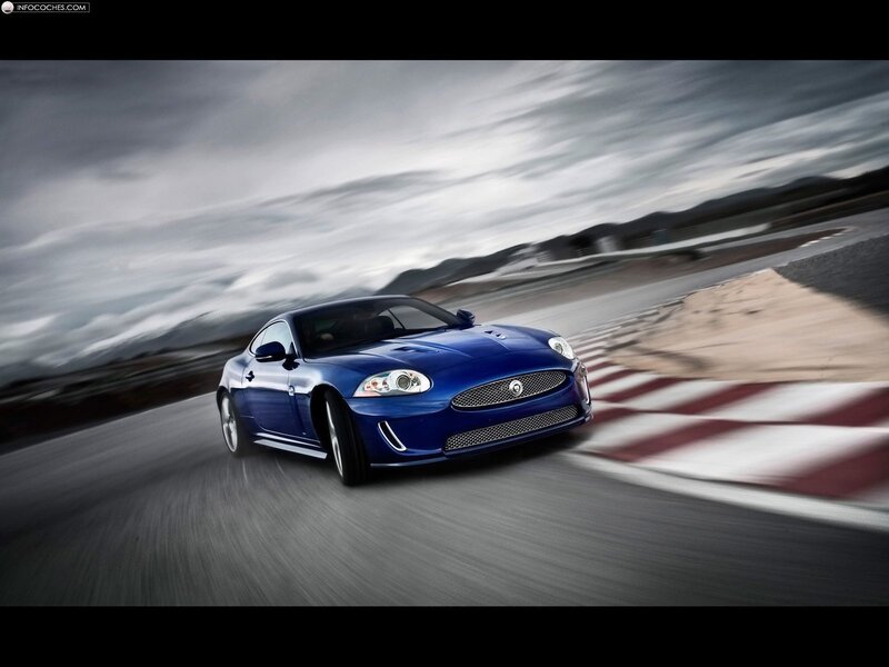 blue jaguar on racetrack