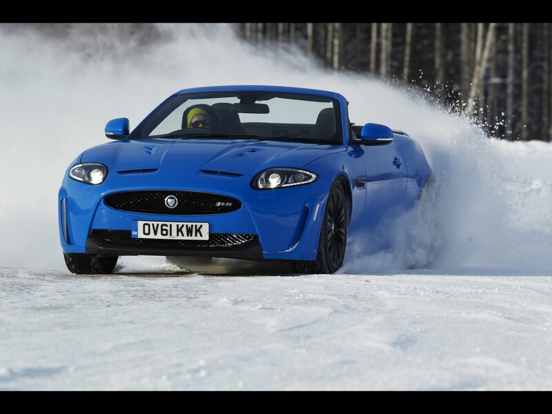 Blue Jaguar R-S Convertible on Snow