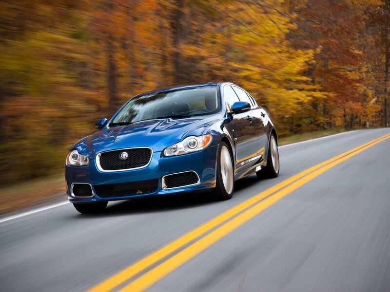 Blue Jaguar Sedan — Dynamic, Autumn