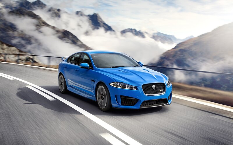 Blue Jaguar Sedan — Dynamic