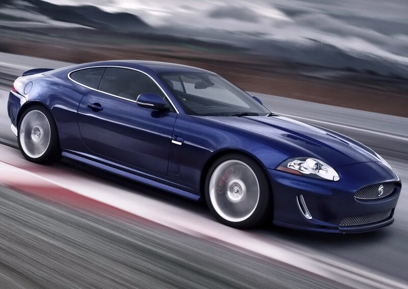 blue jaguar speeding on track