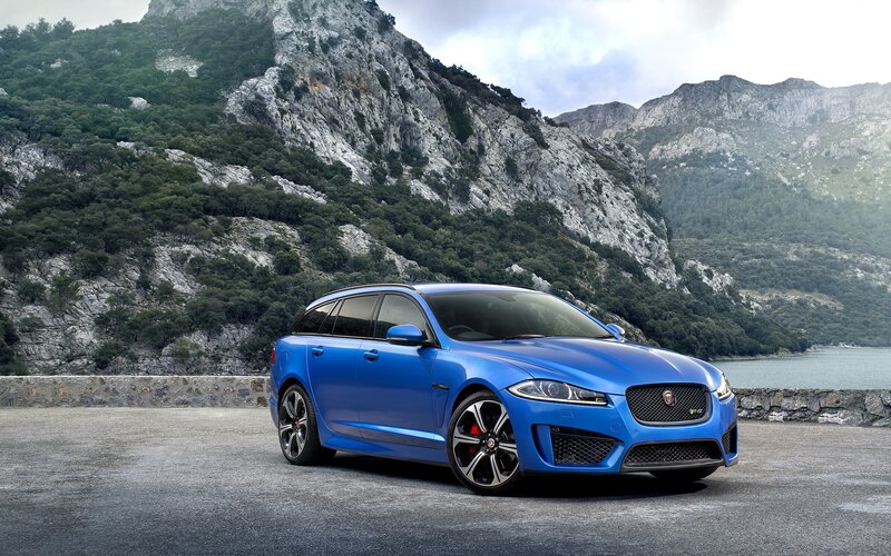 Blue Jaguar Station Wagon — Dramatic
