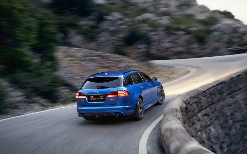 Blue Jaguar Station Wagon — Dynamic, Sunset