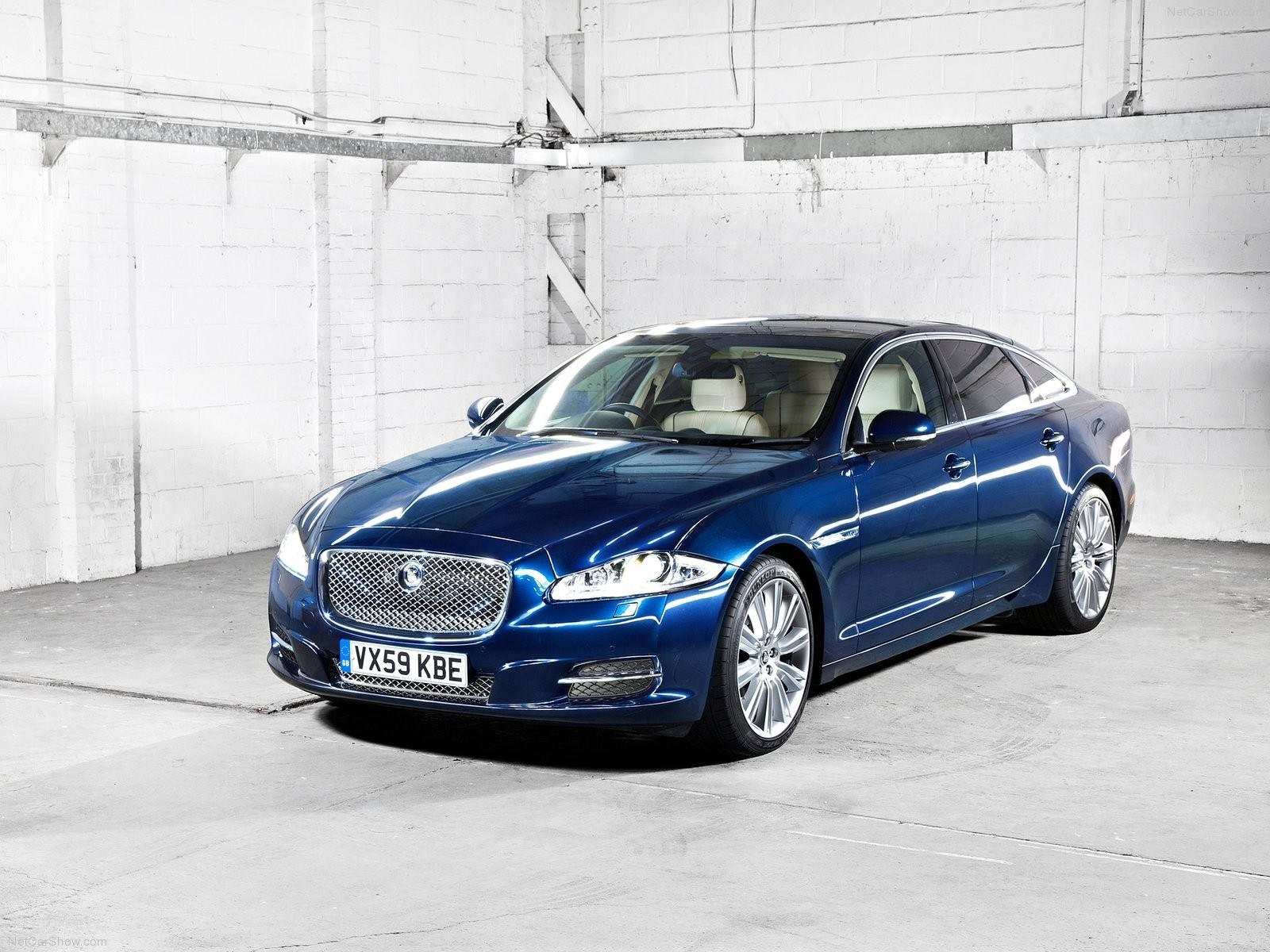 Blue Jaguar XJ Sedan