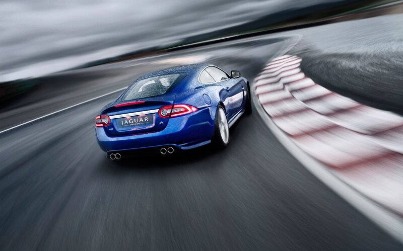 Blue Jaguar XKR on a racetrack