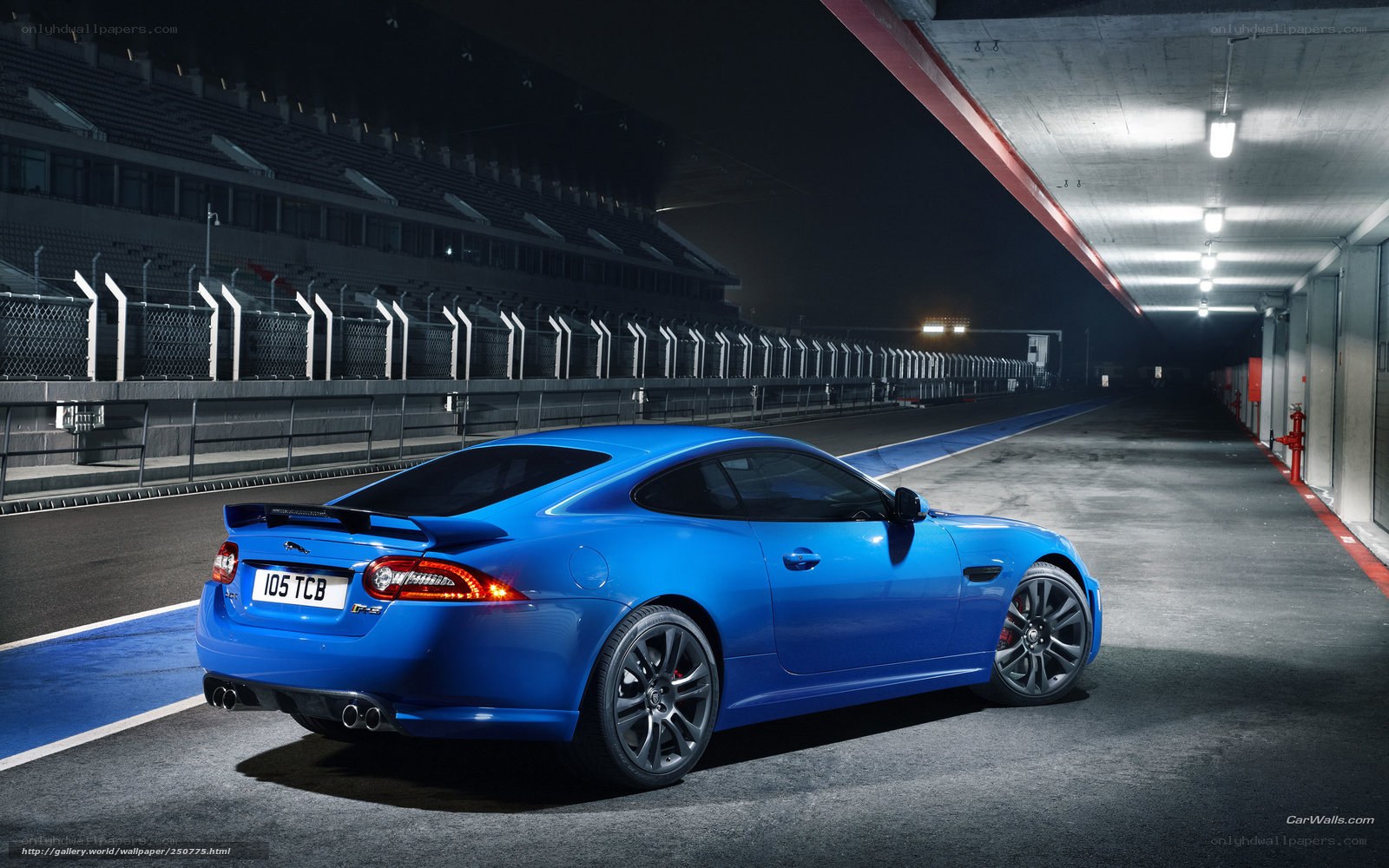 Blue Jaguar XKR on racetrack