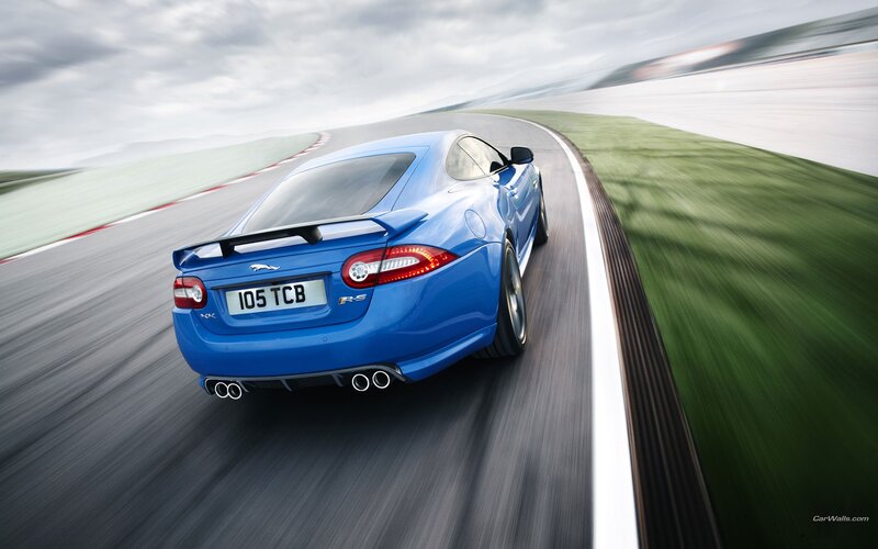 Blue Jaguar XKR-S on a racetrack