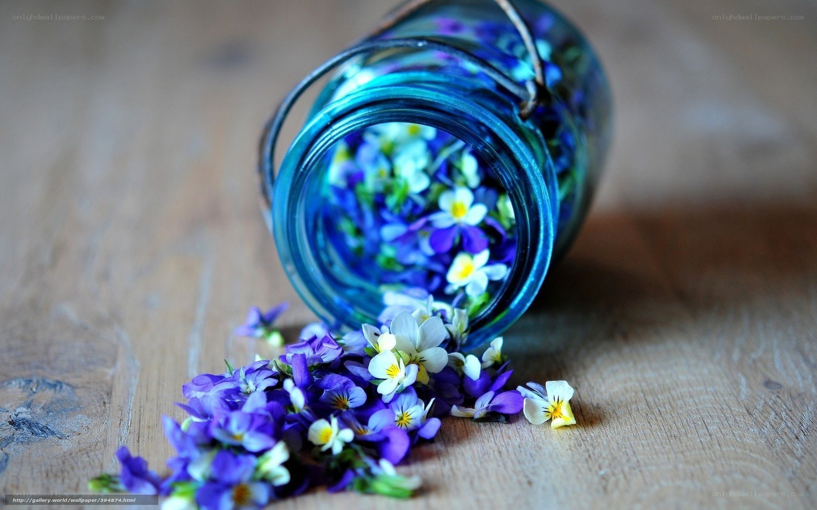 Blue jar with purple flowers