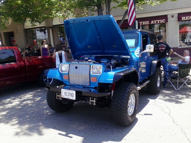 Blue Jeep with Open Hood