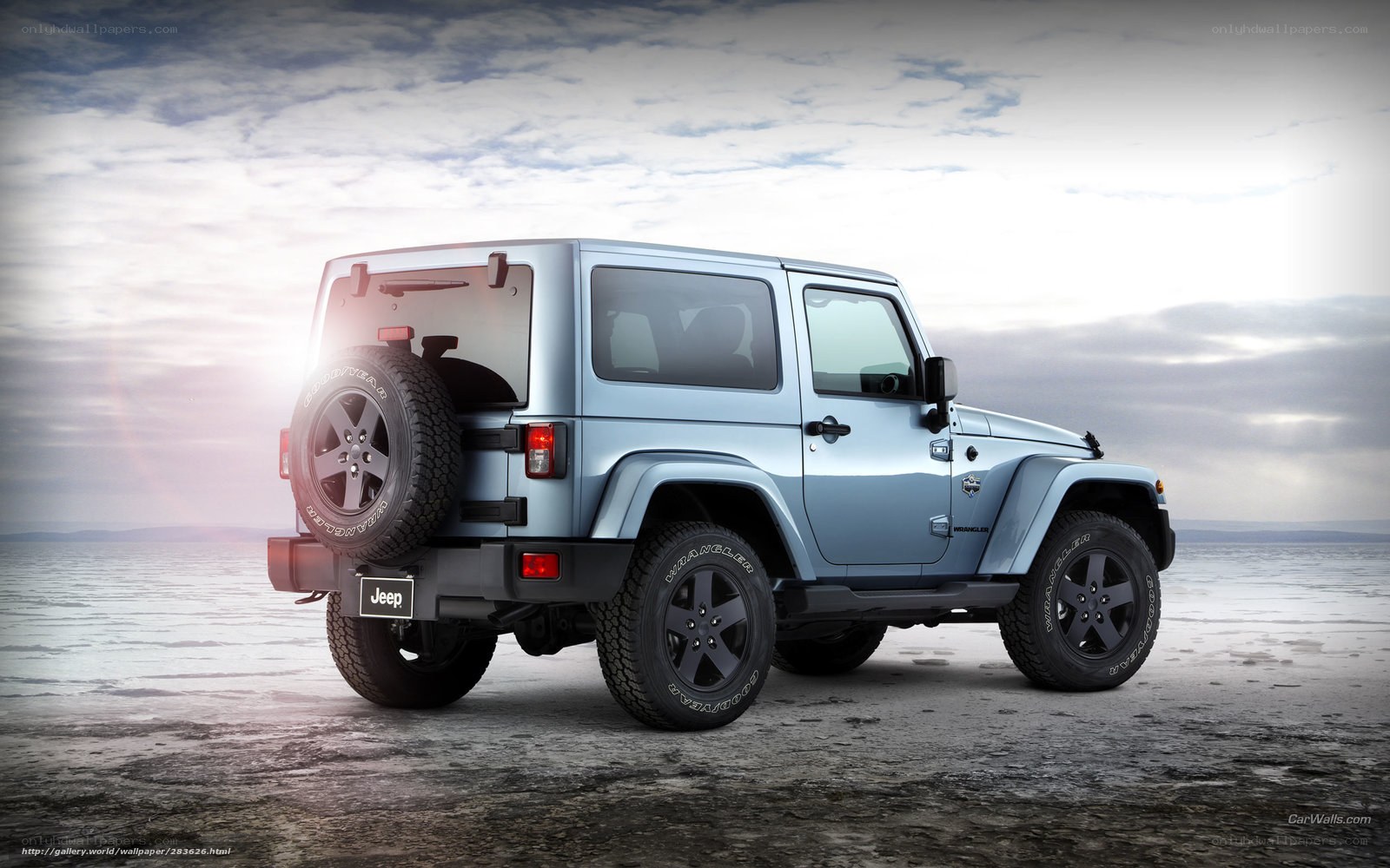 Blue Jeep Wrangler on salt flat