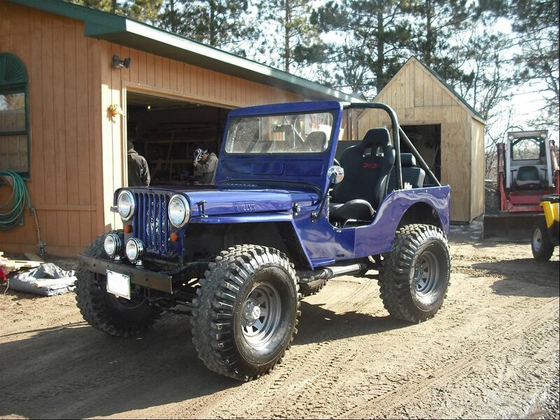 Blue Jeep Wrangler — Outdoor, Afternoon