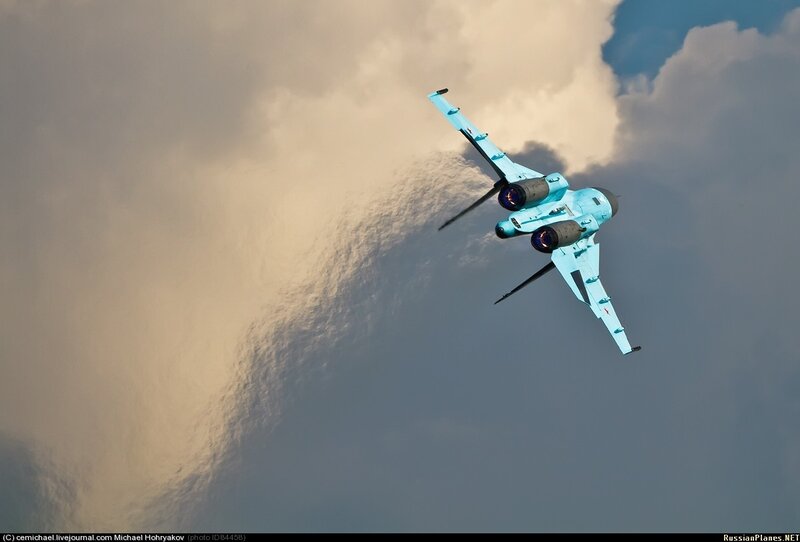 Blue jet in cloudy sky