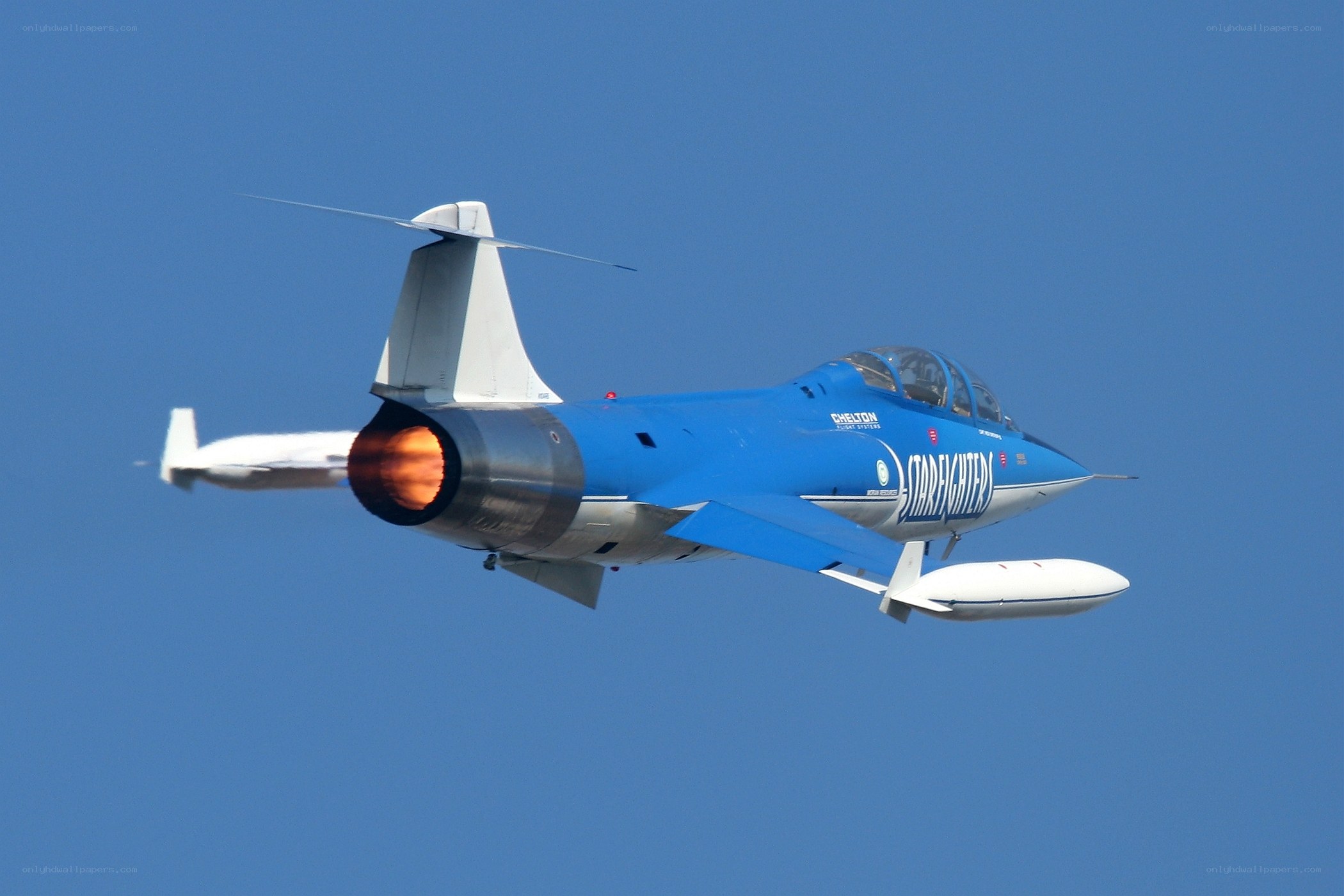 Blue jet in flight