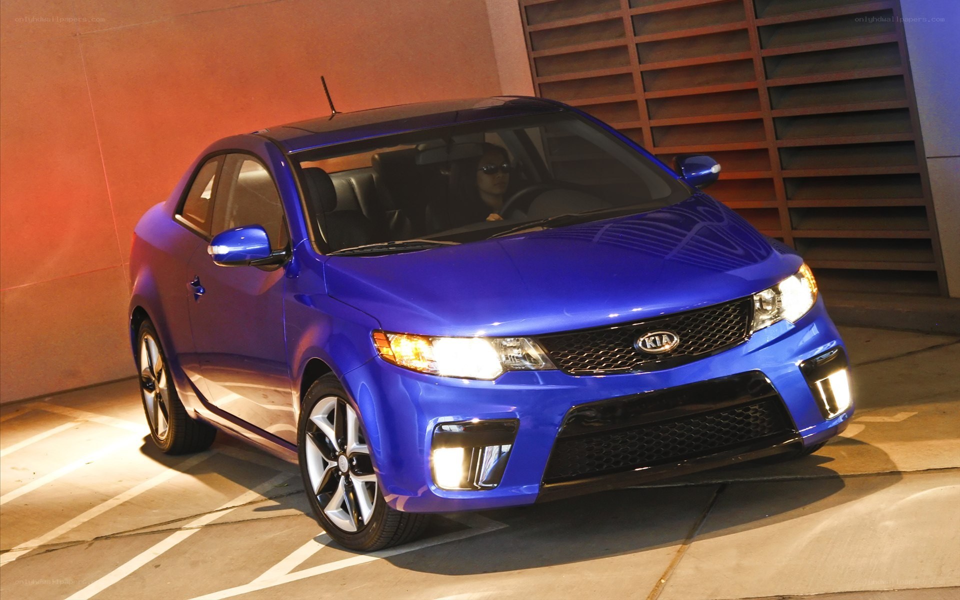 Blue Kia Forte Coupe
