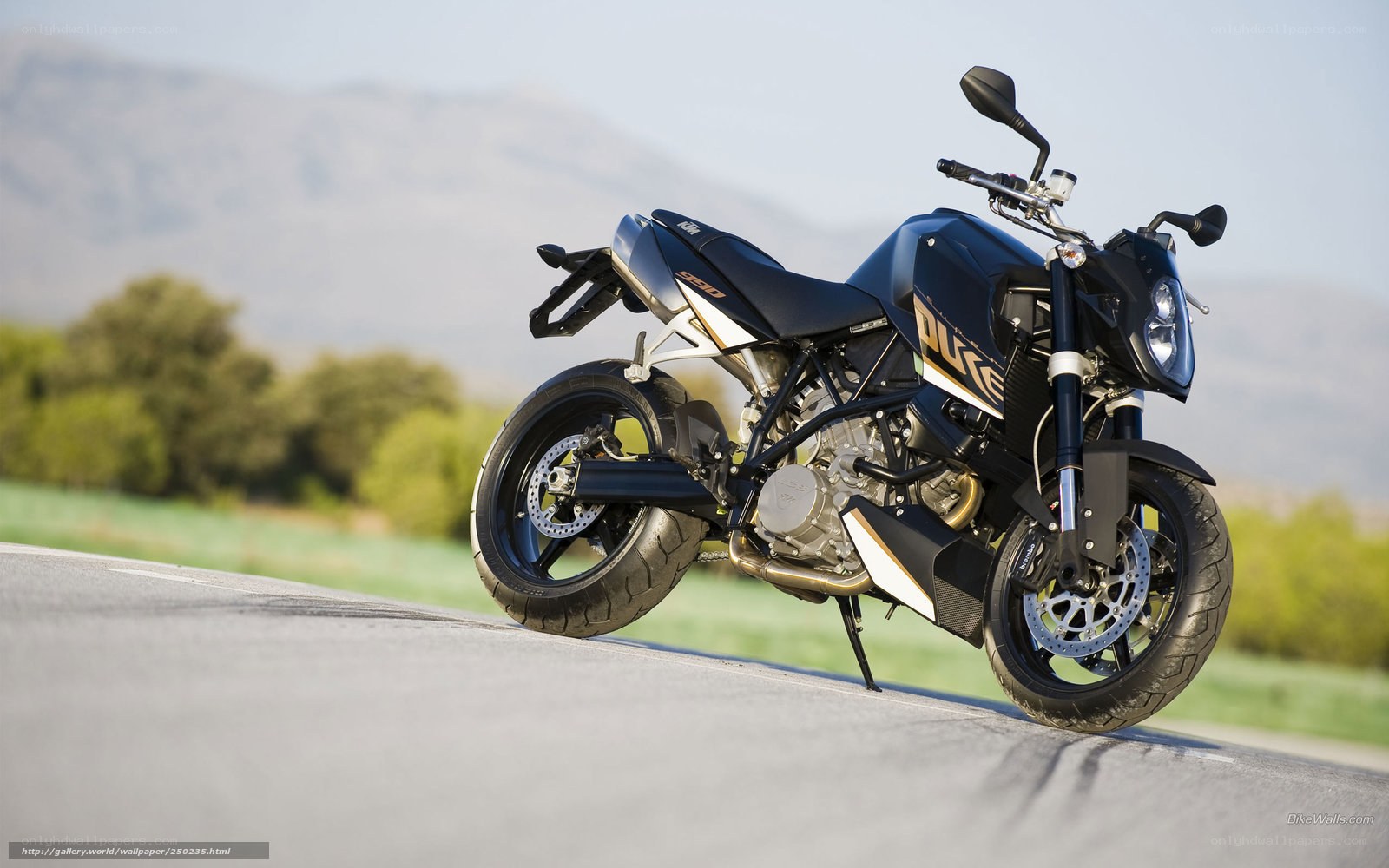 Blue KTM Duke motorcycle on road