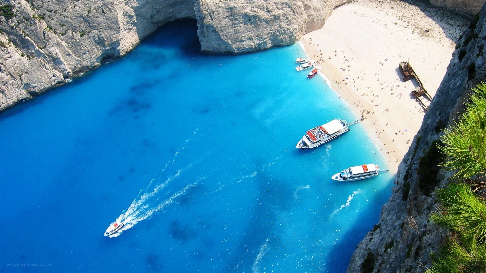 blue lagoon beach with boats