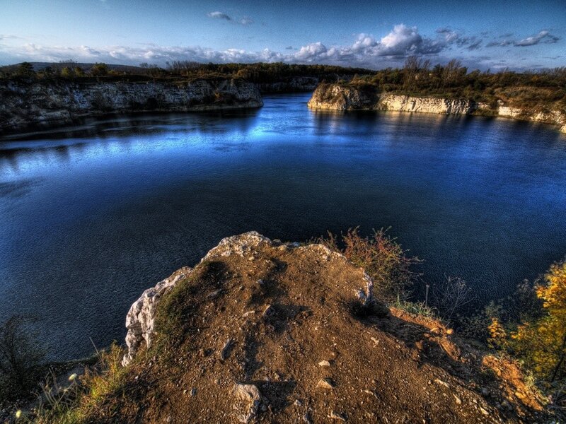 Blue lake in rocky canyon