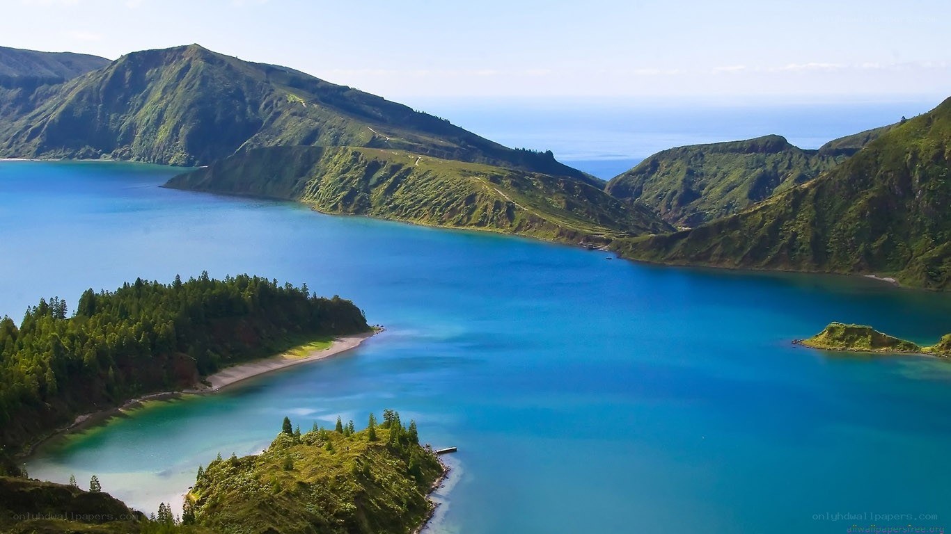 blue lake in volcanic crater