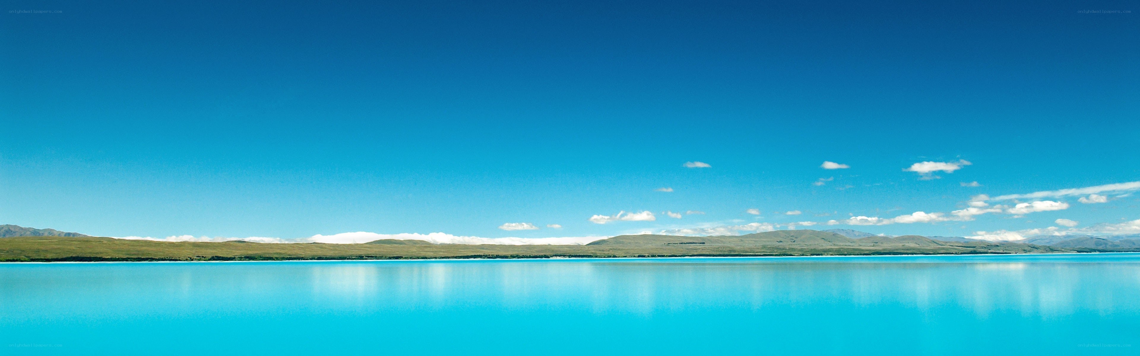 Blue lake under clear sky