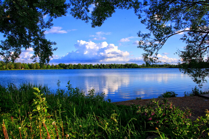 Blue Lake under Cloudy Sky — Serene