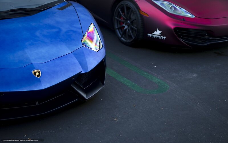 Blue Lamborghini and purple car