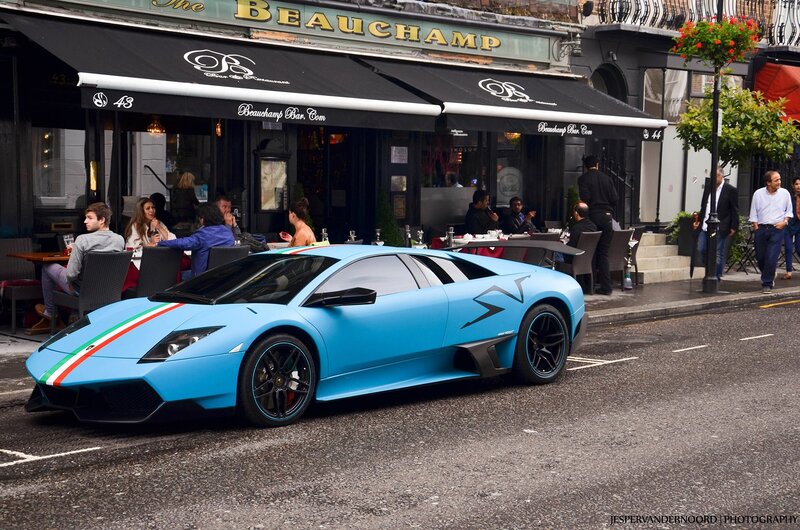 Blue Lamborghini at a London restaurant