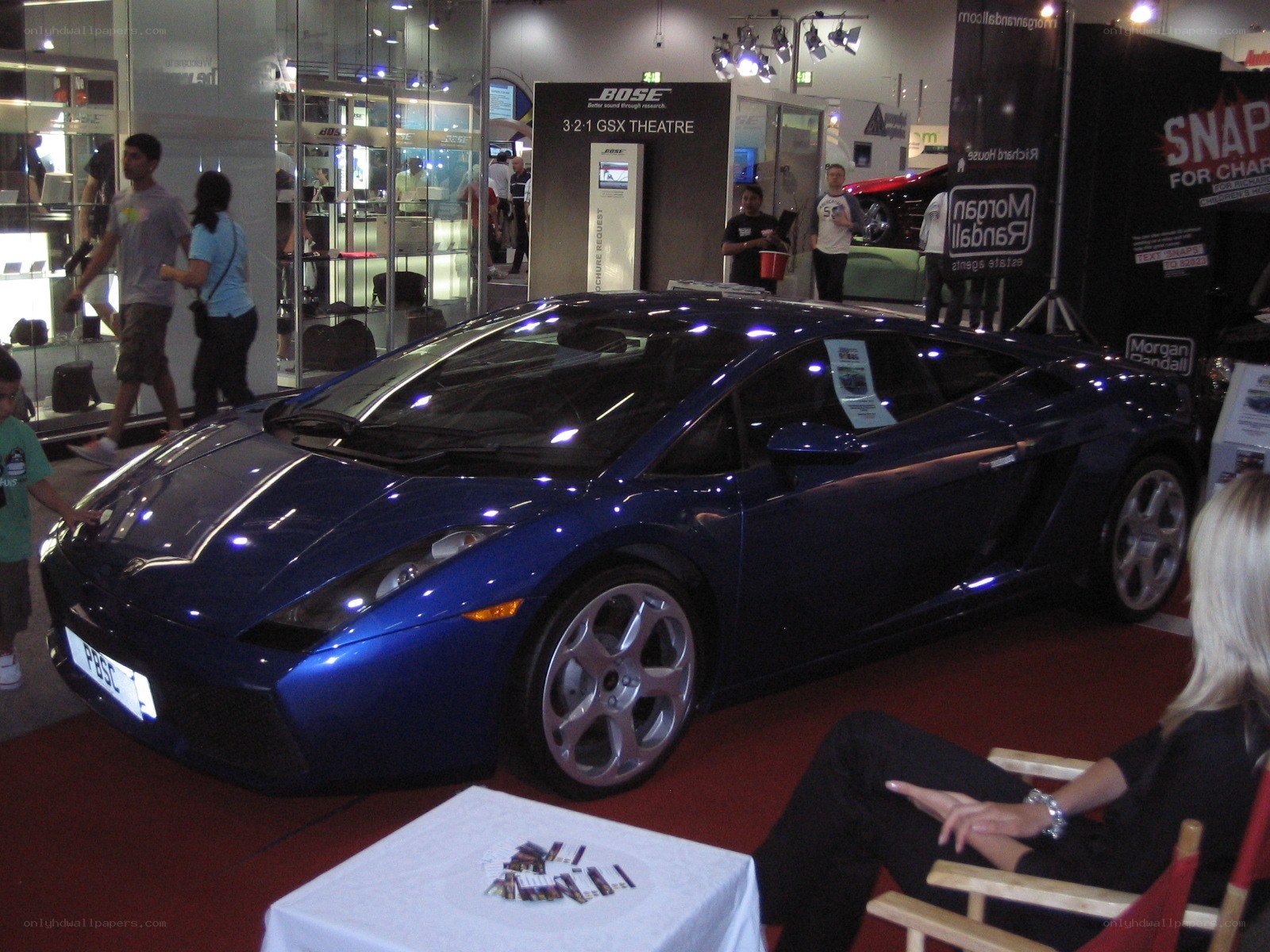 Blue Lamborghini at an auto show