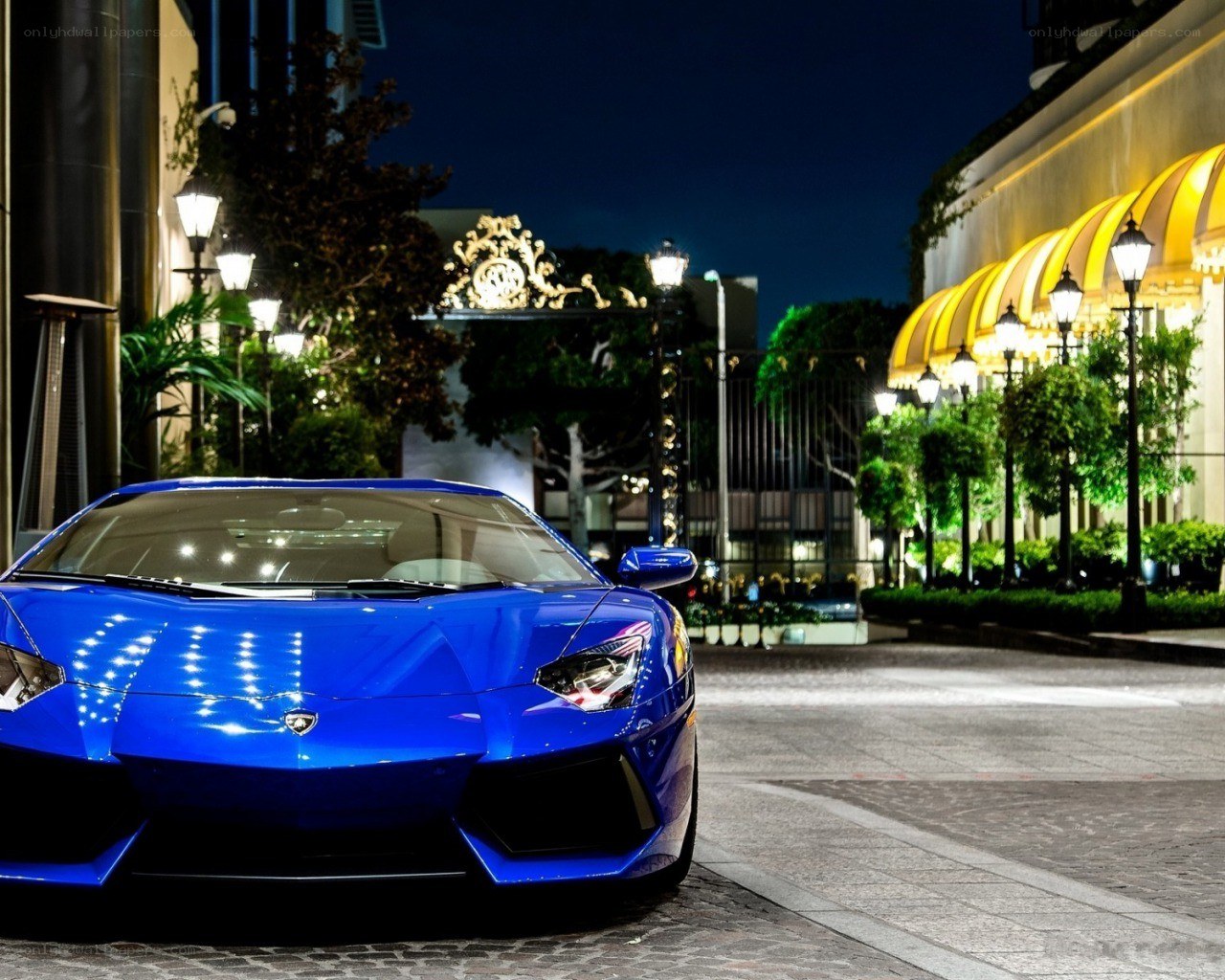 Blue Lamborghini at night