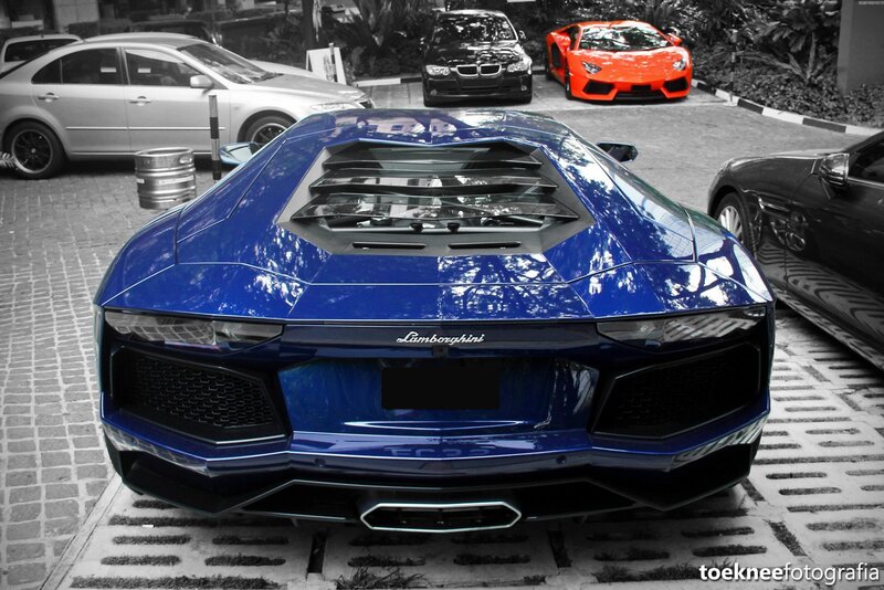 Blue Lamborghini Aventador rear view